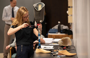 student working in prosthetics lab