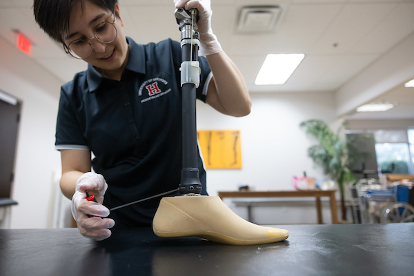 mspo student building prosthetic leg