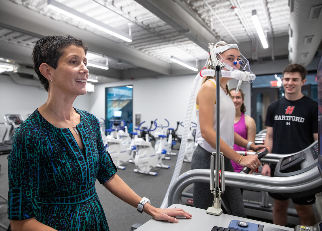 professor and student working in exercise science class