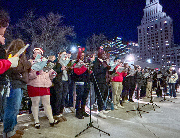 UHart singing group sharing holiday songs in Hartford