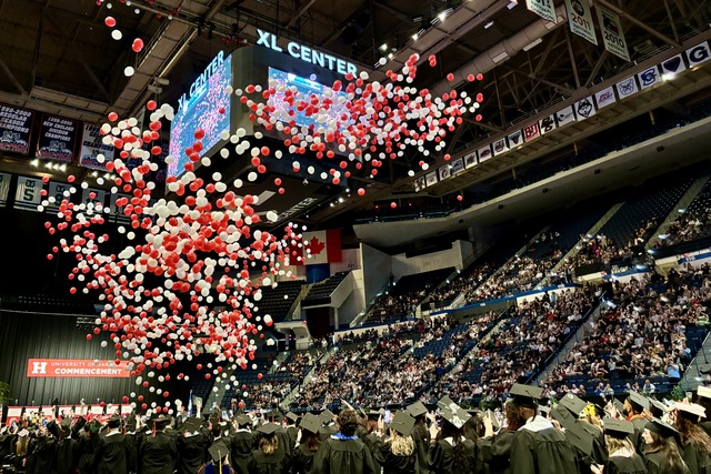 Balloon drop at UHart Commencement on May 12
