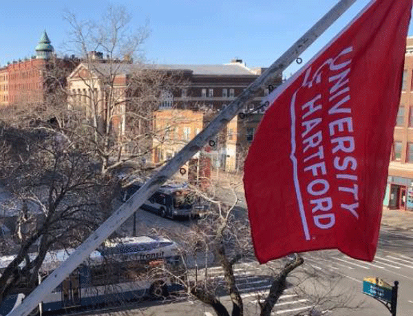 a photo of the UHart flag at city hall